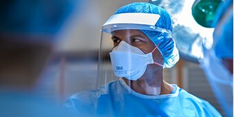 A health care provider wearing PPE equipment
