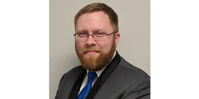 Portrætfoto af Ed Nelson.
