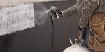 Et spraylimlaminat til et stort overfladeareal
