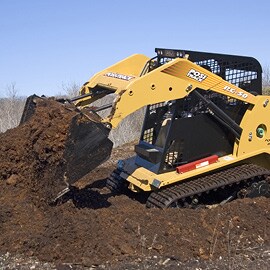 Gul bulldozer med højtydende lak, der fjerner jord